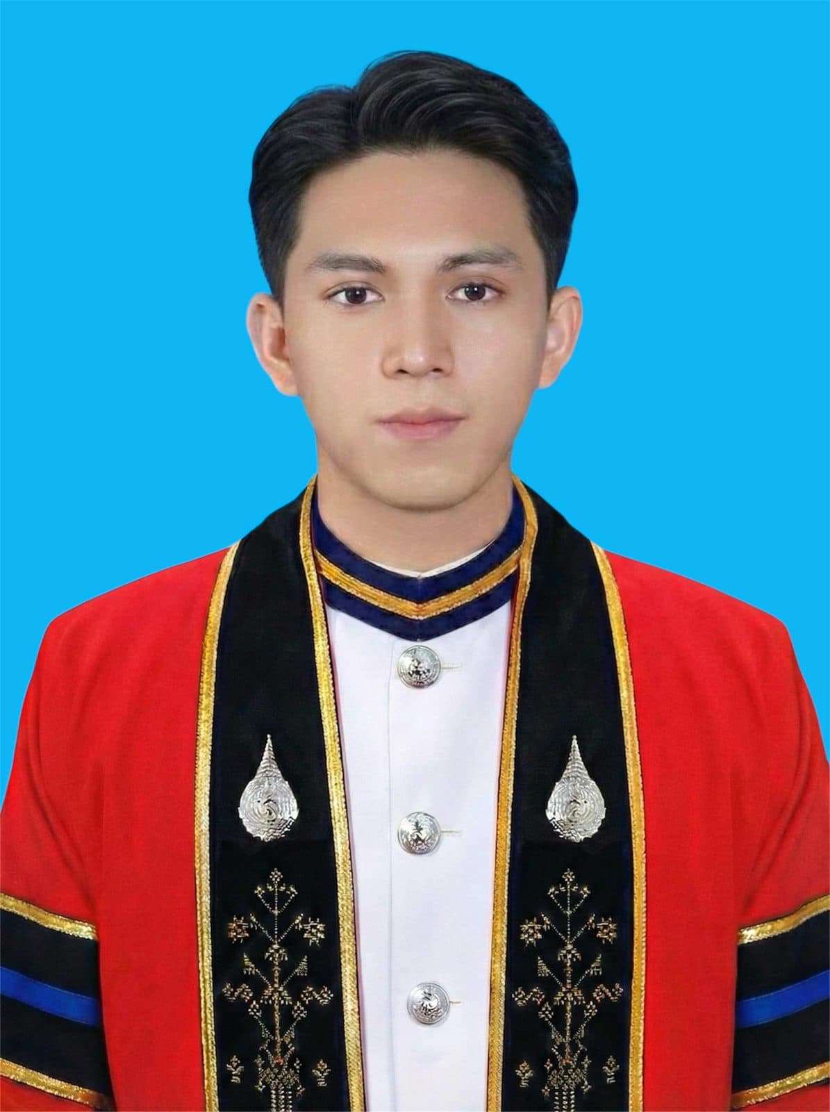 Buk in his MFU graduation gown